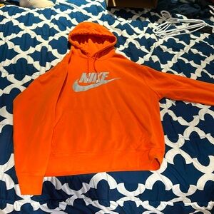 Nike hoodie, large, orange, silver logo.